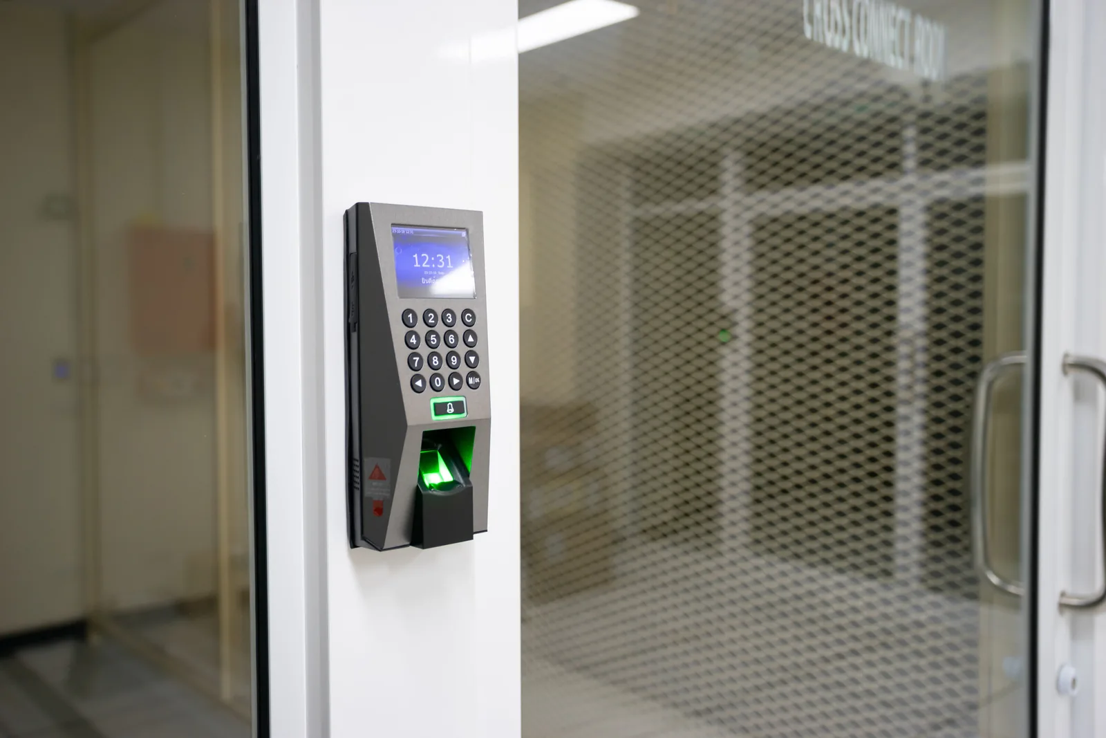 Electronic access reader beside a controlled office door