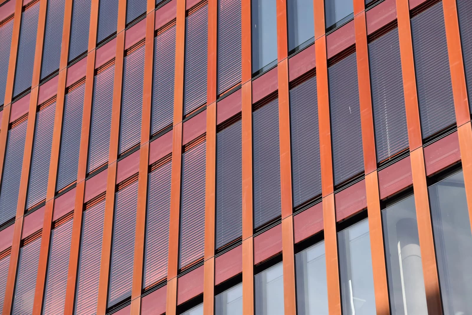 Modern commercial office facade with glazing and sunshades