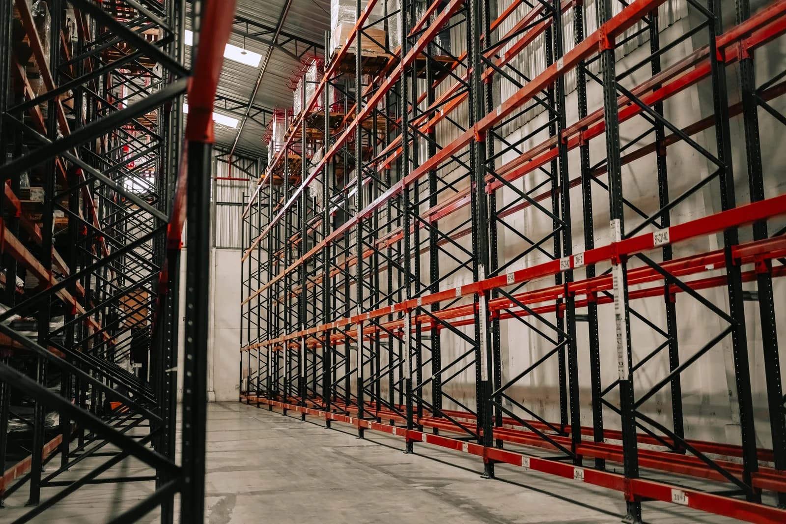 Warehouse aisle with industrial storage racks